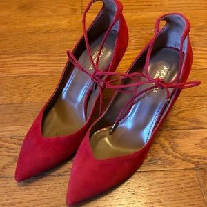 Aquazzura red heel with tie design.